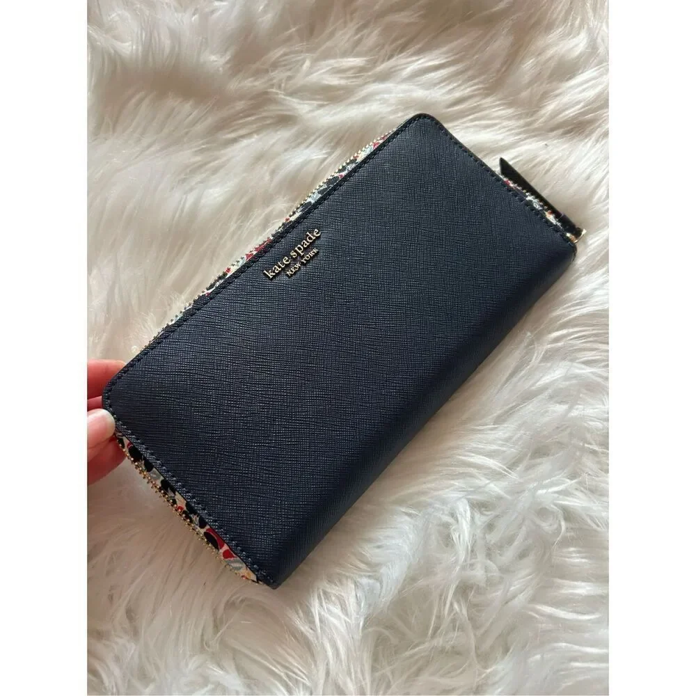 Kate spade dark blue navy wallet in excellent condition 8x4